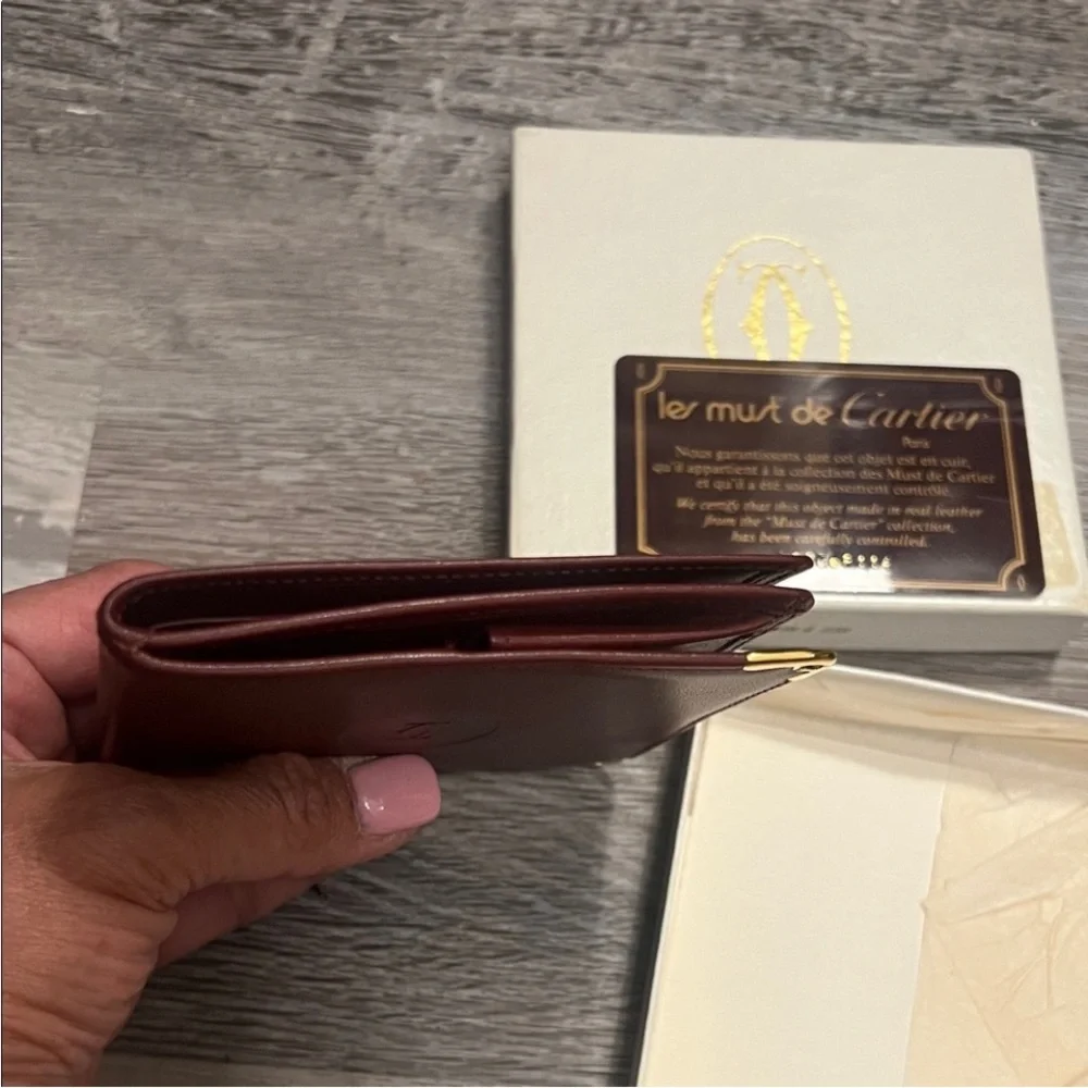 Cartier Burgundy Leather Wallet with Gold Accents
